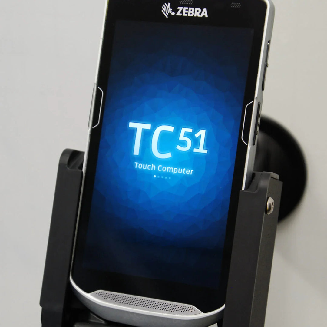 Zebra TC51 touch computer in a desktop charging cradle